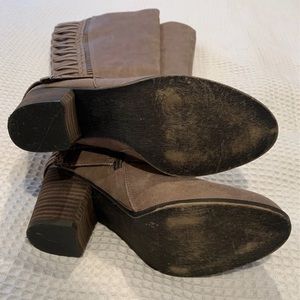 Tall gray heeled boots